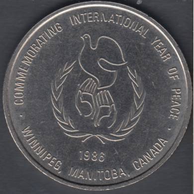 1986 - Winnipeg MB. - International Years of Peace - Trade Dollar de Commerce
